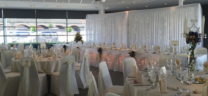 The Pavillion at Chester Racecourse set up for a Wedding. Long Head Table decor 